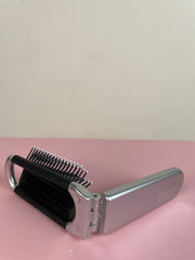 Mini cepillo para el pelo